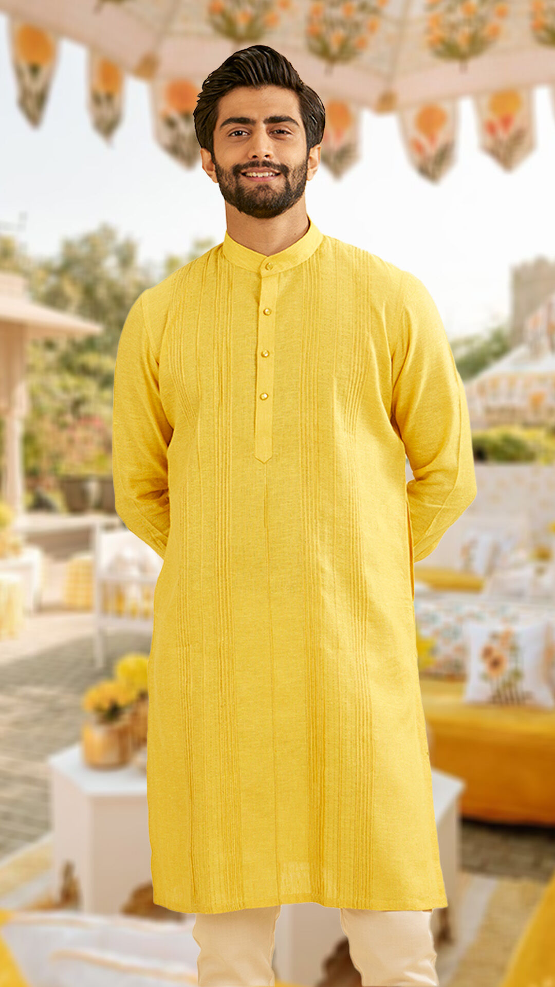 A man wearing yellow kurta pajama for sisters wedding